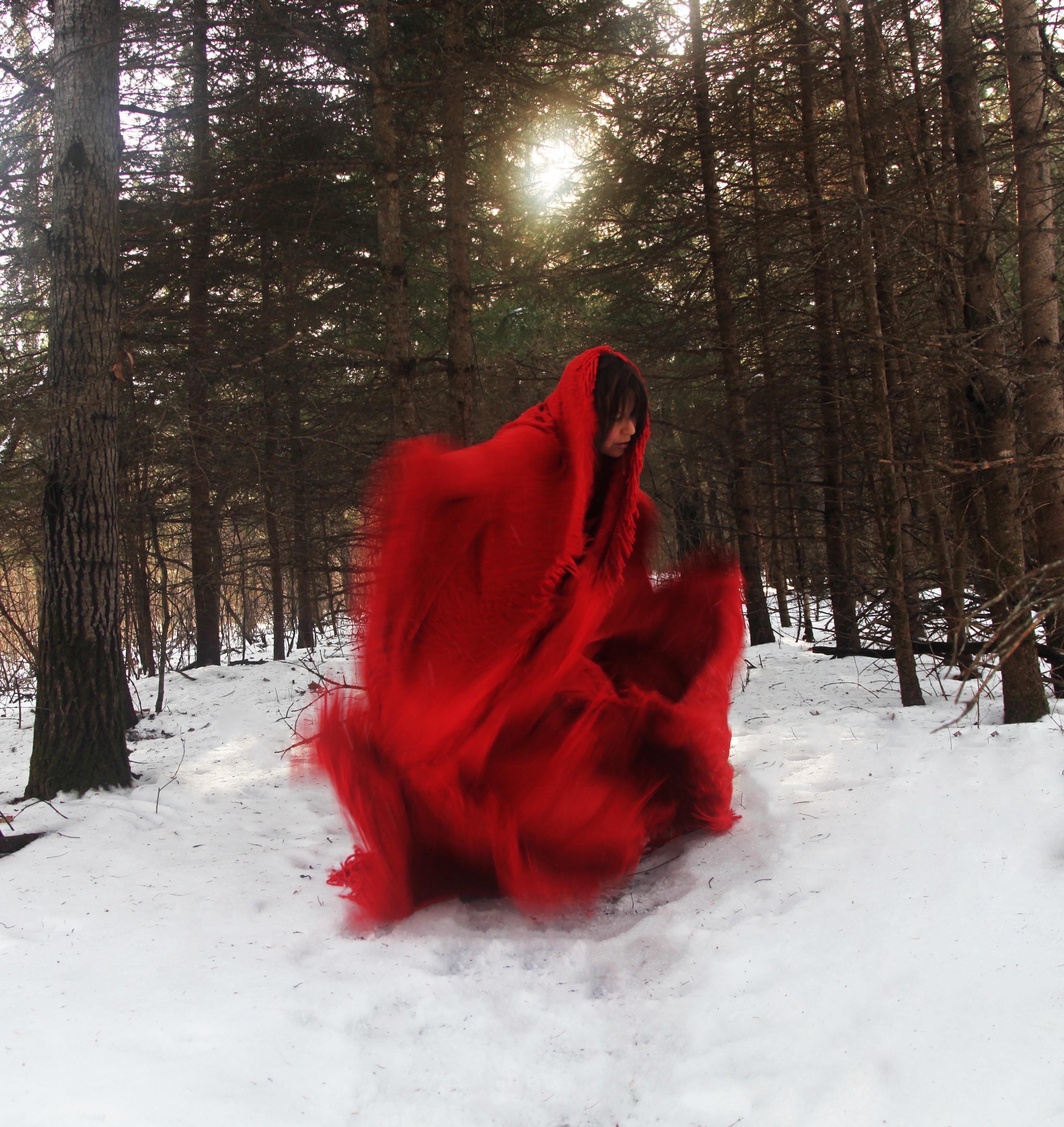 photo of woman in red dress by artist Jaime Black-Morsette
